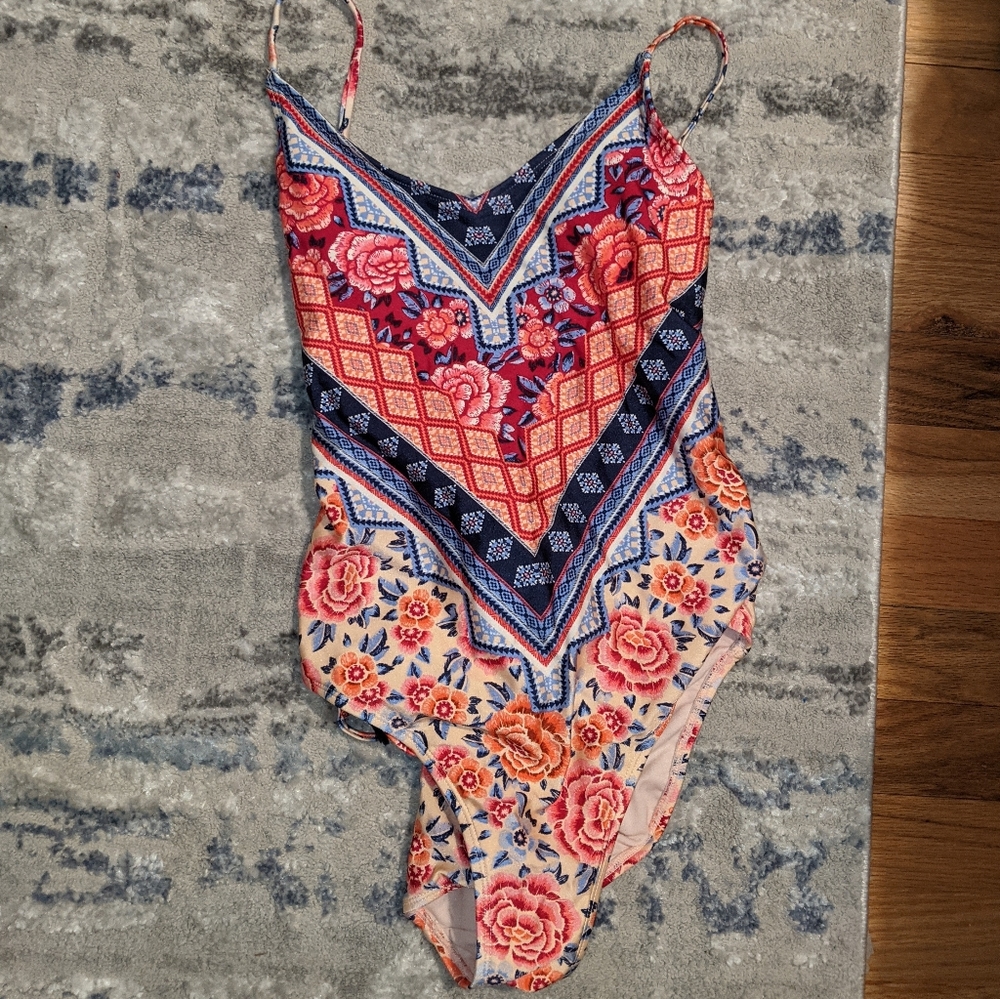 No boundaries print one piece with tassel details